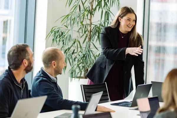 Woman presenting strategic consulting and vCIO solutions for businesses using managed IT services Perth