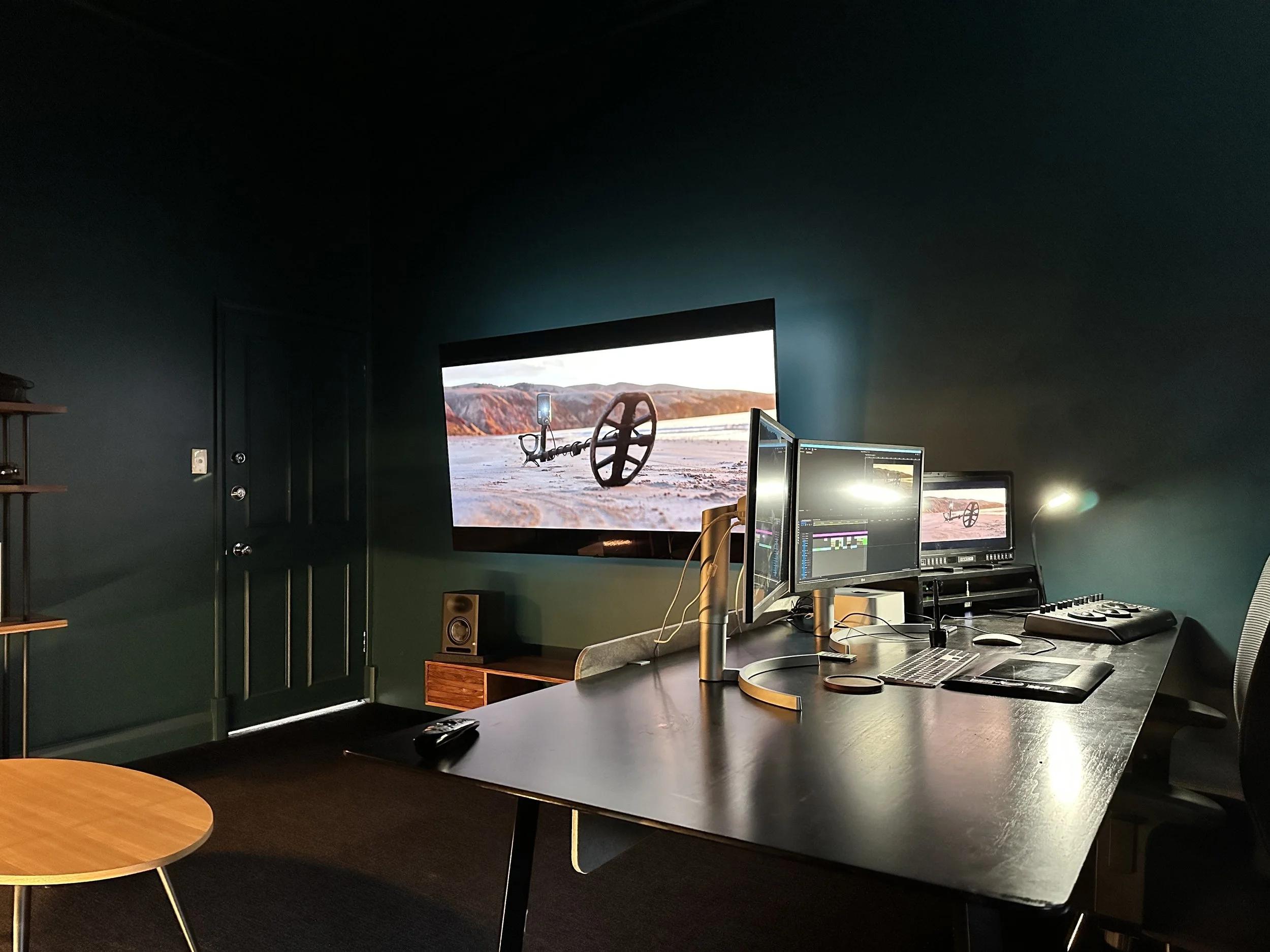 Room with desk, chair and TV for media and communications, supported by professional IT support Perth services.