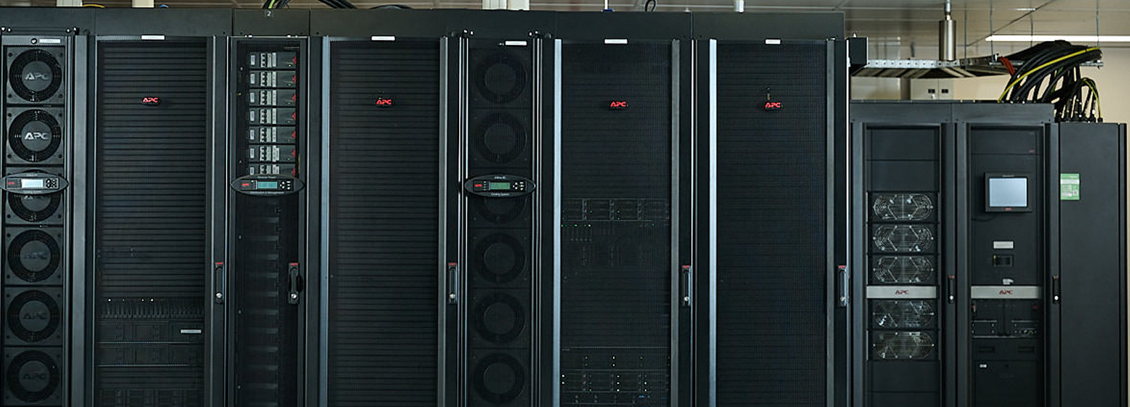 A row of servers lined up in a data center room in Perth, showcasing organised technology infrastructure.